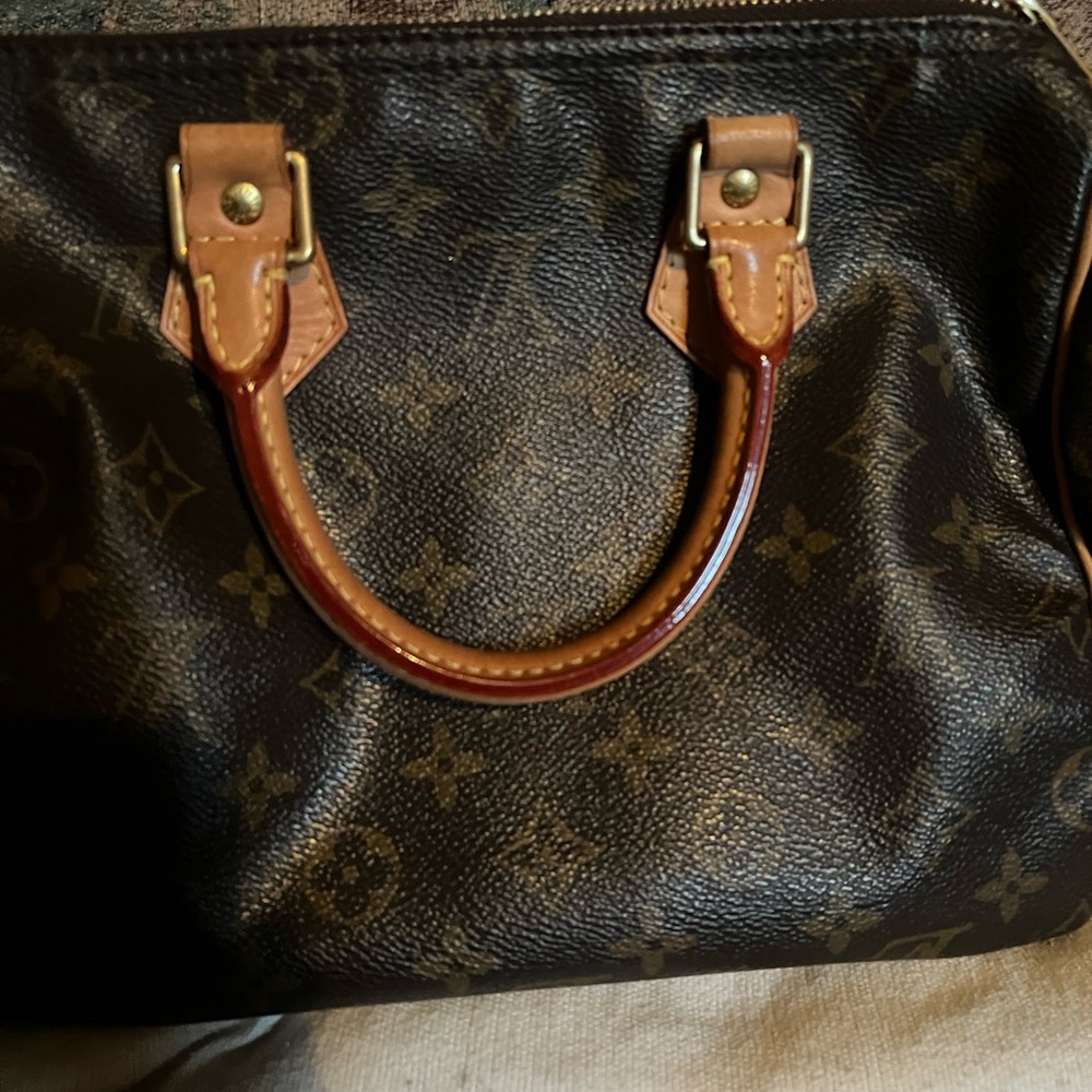 Louis Vuitton Speedy 25. Guaranteed authentic. In very good condition.